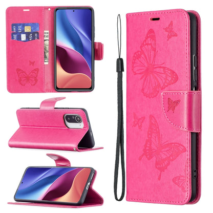 Rose red leather phone case with embossed butterfly pattern and card slot