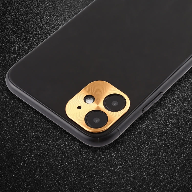 Gold rear camera lens protective film on phone back, cardboard-style