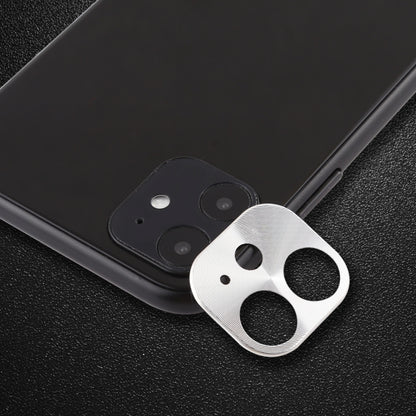 Silver rear camera lens protective film on phone back, cardboard-style cutout
