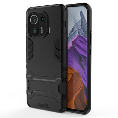 Rugged shockproof phone case with hidden holder, black PC+TPU with camera cutouts