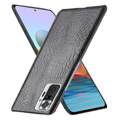 Black crocodile-texture shockproof phone case with camera cutout, angled view