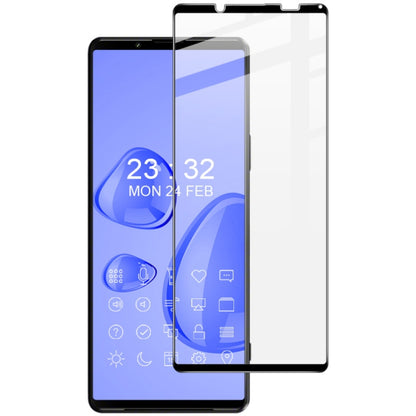 Full coverage tempered glass screen protector film over smartphone display