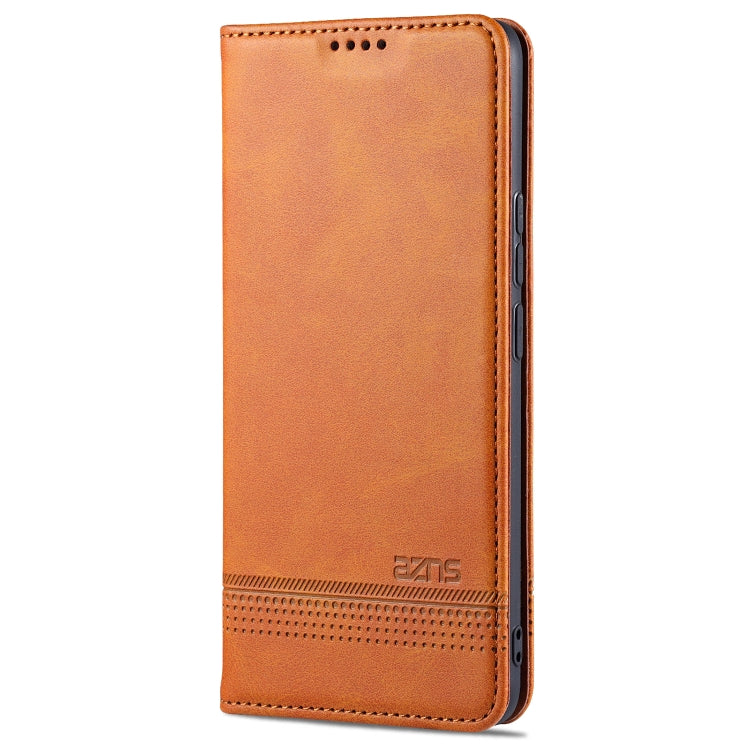 Tan leather phone flip wallet case with perforated speaker area and stitched edges