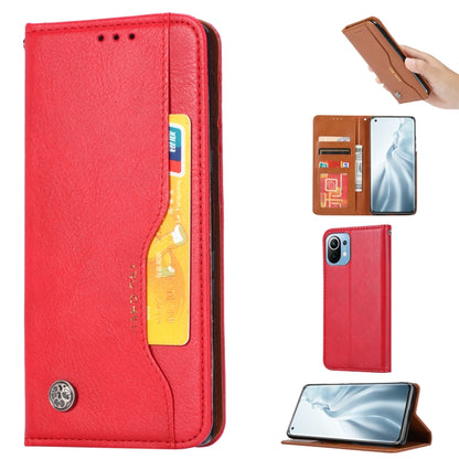 Red leather flip wallet phone case with card slot cutout and built-in stand