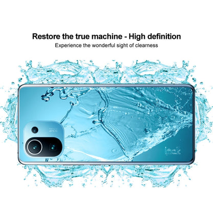 Clear protective TPU case for a phone with dual camera cutout and raised bezel