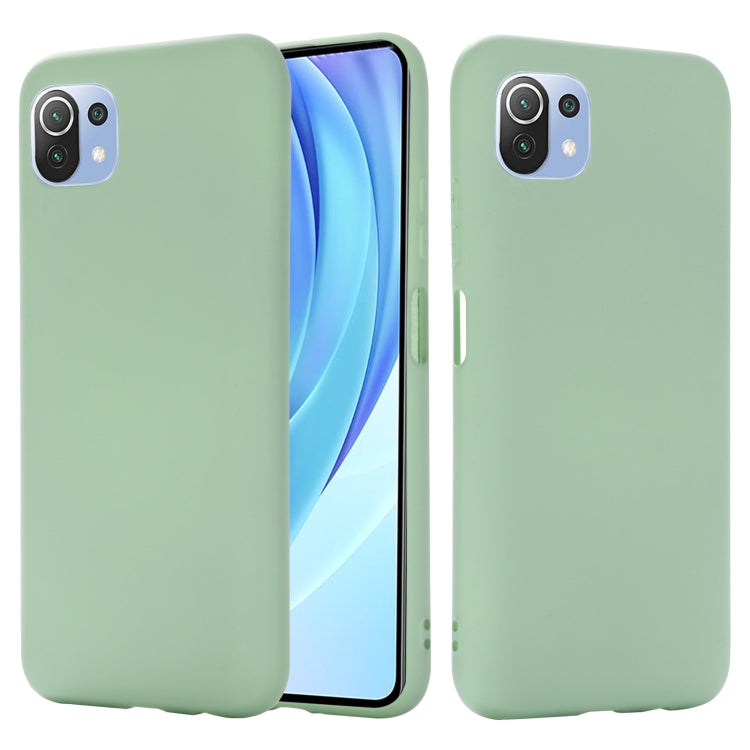 Green liquid silicone protective phone case with cutouts and raised camera edges.