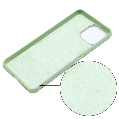 Green liquid silicone phone case texture close-up with precise camera and button openings.