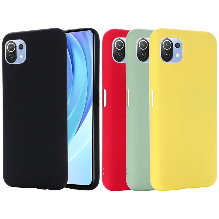 Assorted color liquid silicone protective phone cases: black, red, green, and yellow.