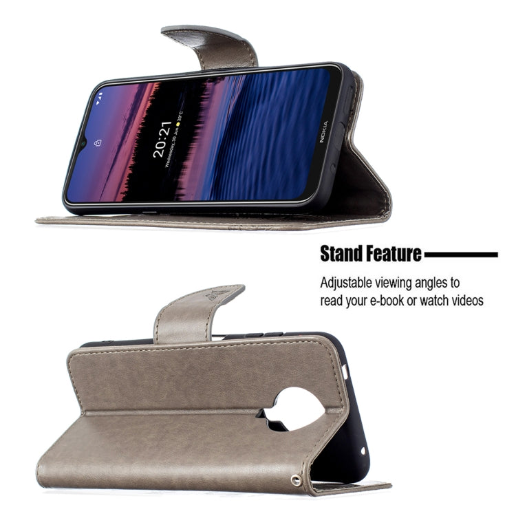 Grey PU leather flip phone case with embossed butterflies, stand, and flip cover