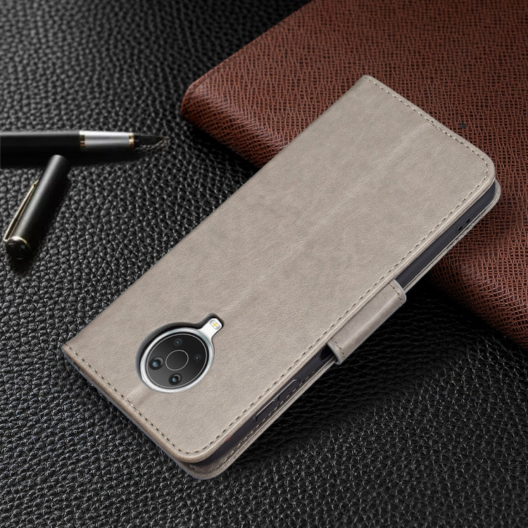 Grey PU leather wallet phone case with camera cutout and stitched flip cover