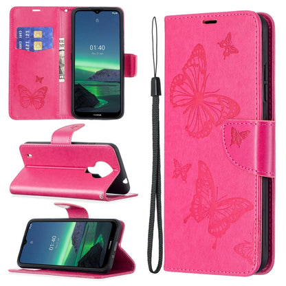 Bright pink PU leather phone wallet case with embossed butterfly pattern and wrist lanyard