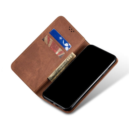 Brown denim flip phone wallet case with card slot holding cards and magnetic snap