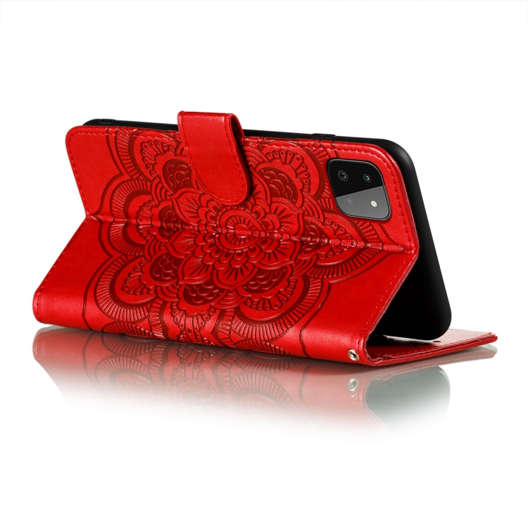 Red embossed mandala flip case with card slots, wrist strap, and secure closure.