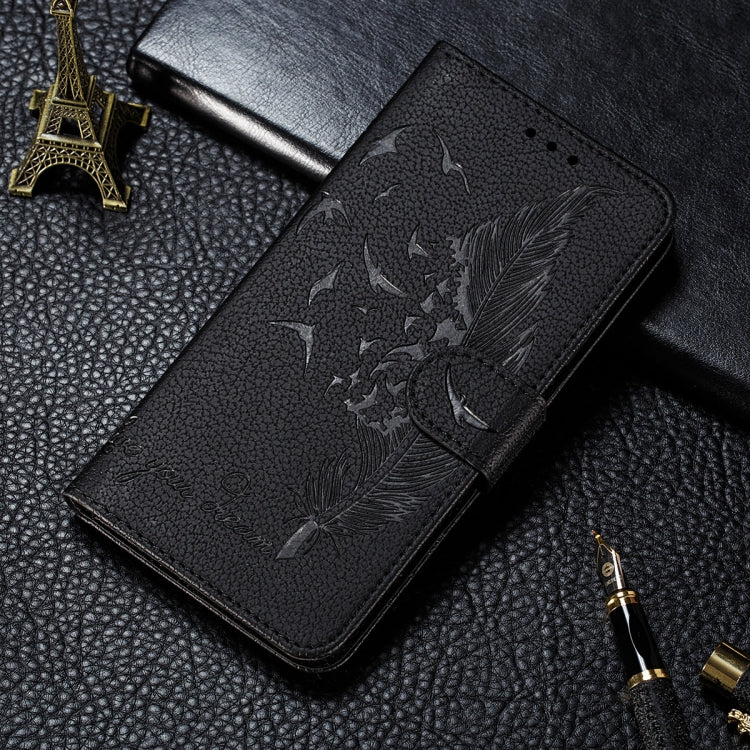 Black leather phone wallet case with embossed feather leaf pattern, flip cover