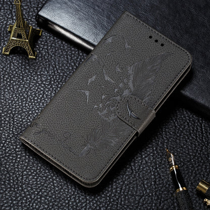 Gray embossed feather-leaf litchi-textured flip phone case with top flap and cutouts