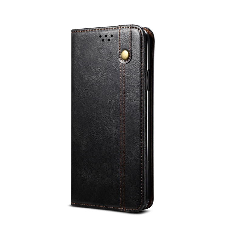 Black leather flip phone wallet case with card slots and magnetic snap, front view.