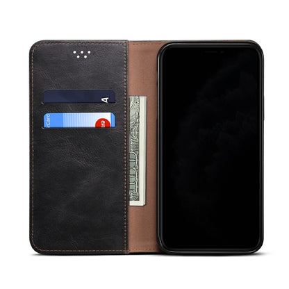 Brown leather flip phone wallet case with card slots showing cards inside.