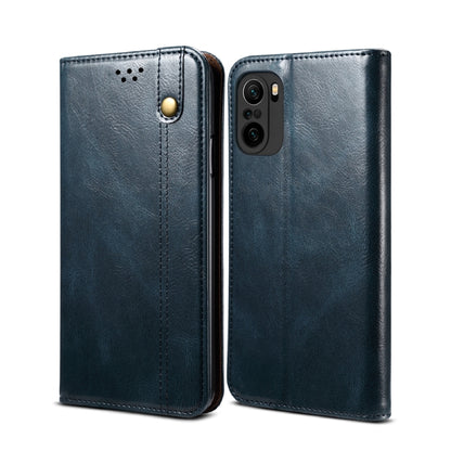 Navy leather flip phone wallet case with card slots and camera cutout, paired front/back.