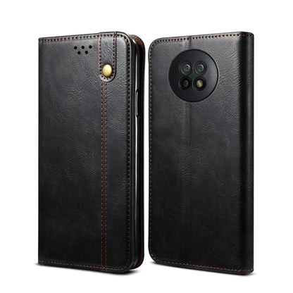 Black flip leather phone case with camera cutout and snap button