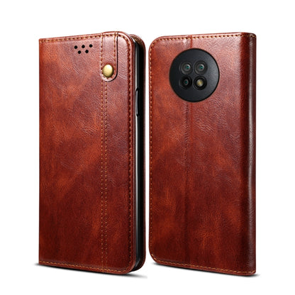 Tan brown flip leather phone case with camera cutout and snap button