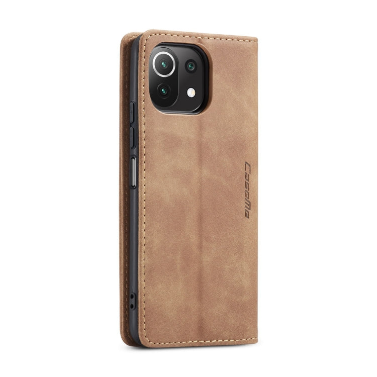 Brown horizontal flip leather phone case with camera cutout and stitched trim