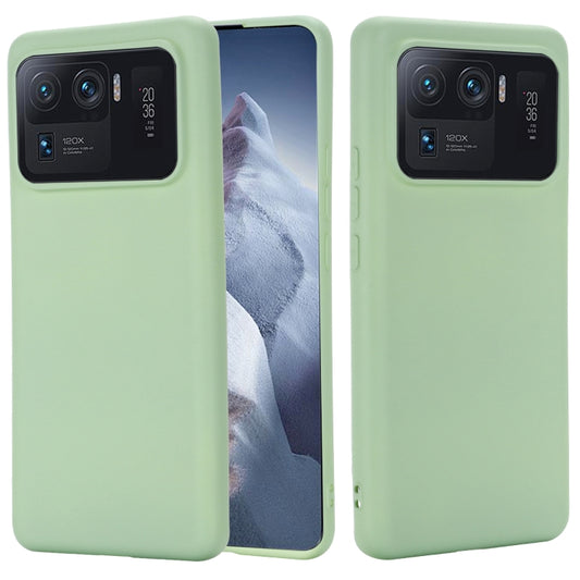 Green liquid silicone protective phone case with camera cutout and raised edge