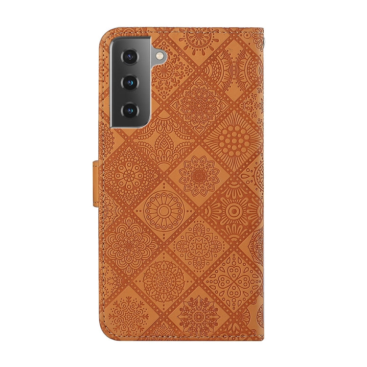 Brown embossed leather phone case, back cutouts and camera openings