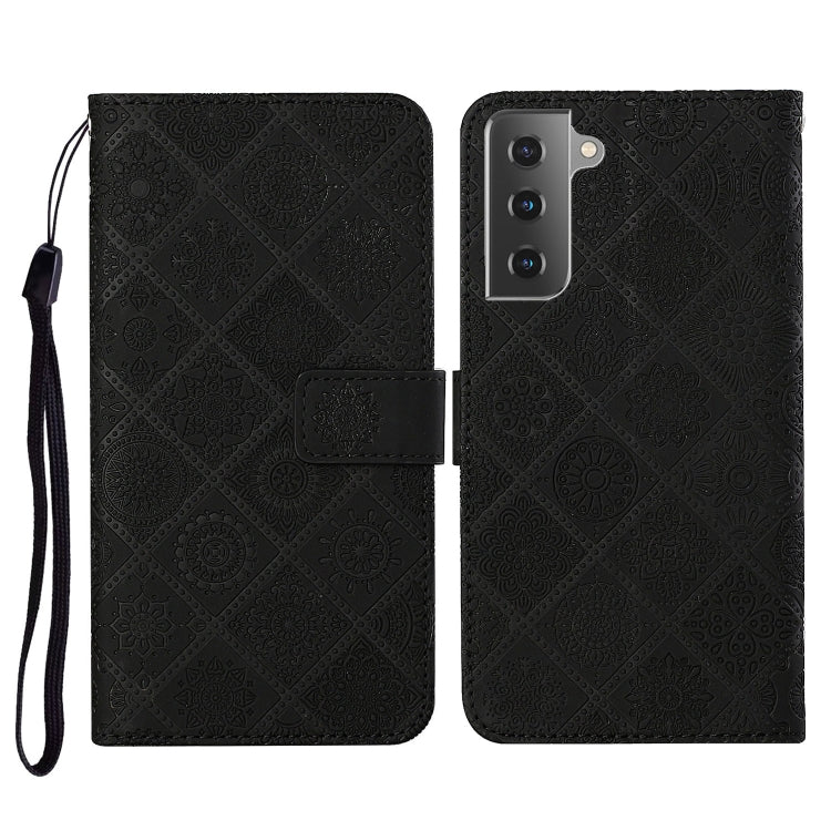Black embossed flip leather phone case with lanyard, card slot and wallet flap