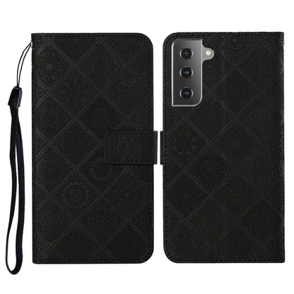 Black embossed flip leather phone case with lanyard, card slot and wallet flap