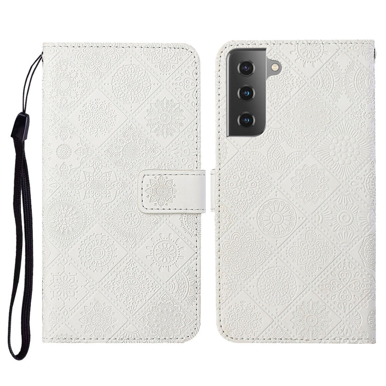 White embossed flip leather phone case with lanyard, card slot and wallet flap