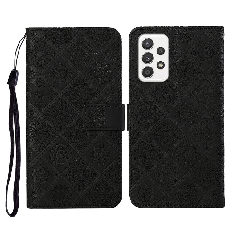 Black embossed flip leather phone case with lanyard and card slot wallet flap