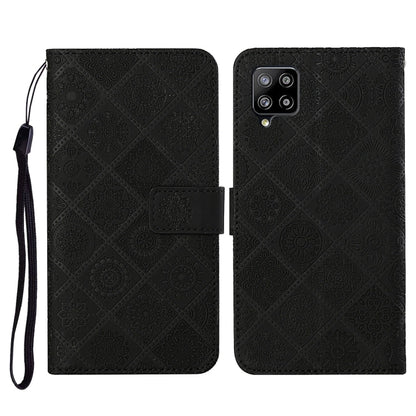 Embossed leather flip phone case with card slots, lanyard strap; black pattern, phone cutout