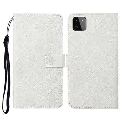 Embossed leather flip phone case with card slots, lanyard strap; off-white textured pattern, phone cutout