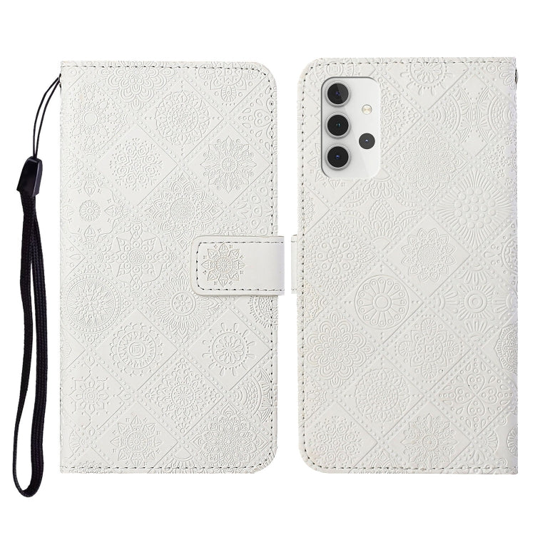 White embossed leather flip phone wallet case with card slots and lanyard strap