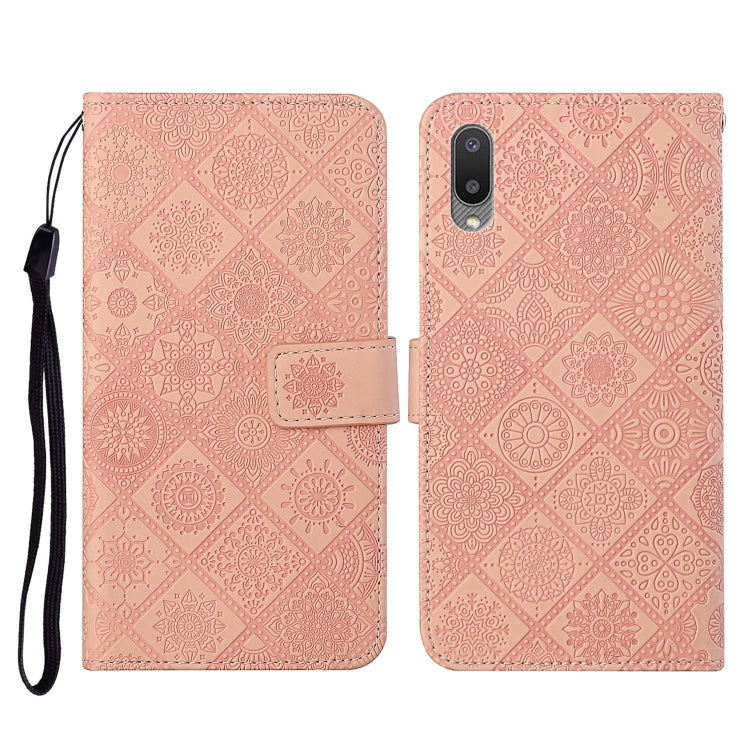 Pink embossed flip leather phone case with card slots, wallet, and lanyard strap