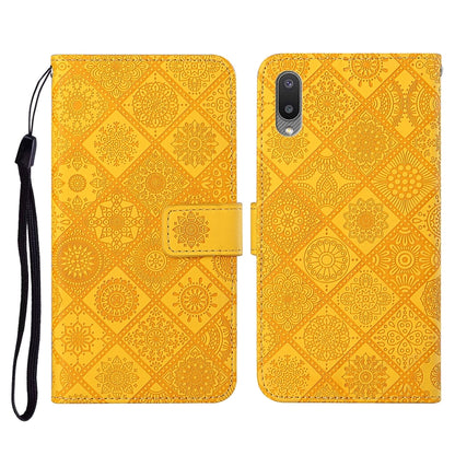 Yellow embossed flip leather phone case with card slots, wallet, and lanyard strap