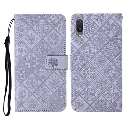Lavender embossed flip leather phone case with card slots, wallet, and lanyard strap