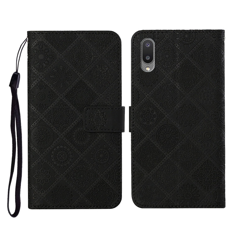 Black embossed flip leather phone case with card slots, wallet, and lanyard strap