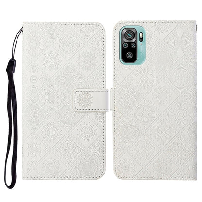 White embossed flip leather phone wallet case with card slots and wrist lanyard.