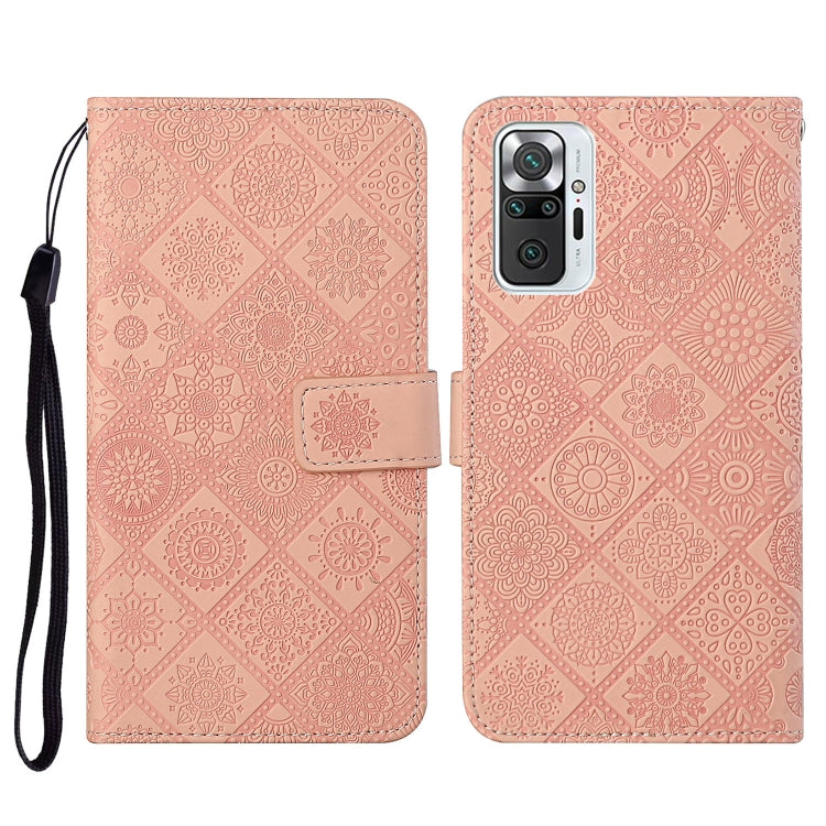 Pink embossed flip leather phone wallet case with card slots and wrist lanyard.
