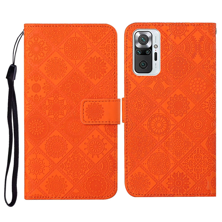 Orange embossed flip leather phone wallet case with card slots and wrist lanyard.