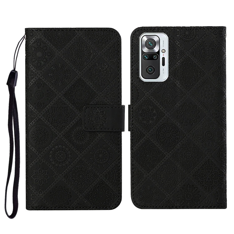 Black embossed flip leather phone wallet case with card slots and wrist lanyard strap.