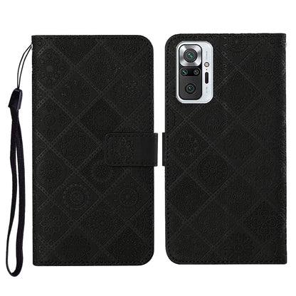 Black embossed flip leather phone wallet case with card slots and wrist lanyard strap.