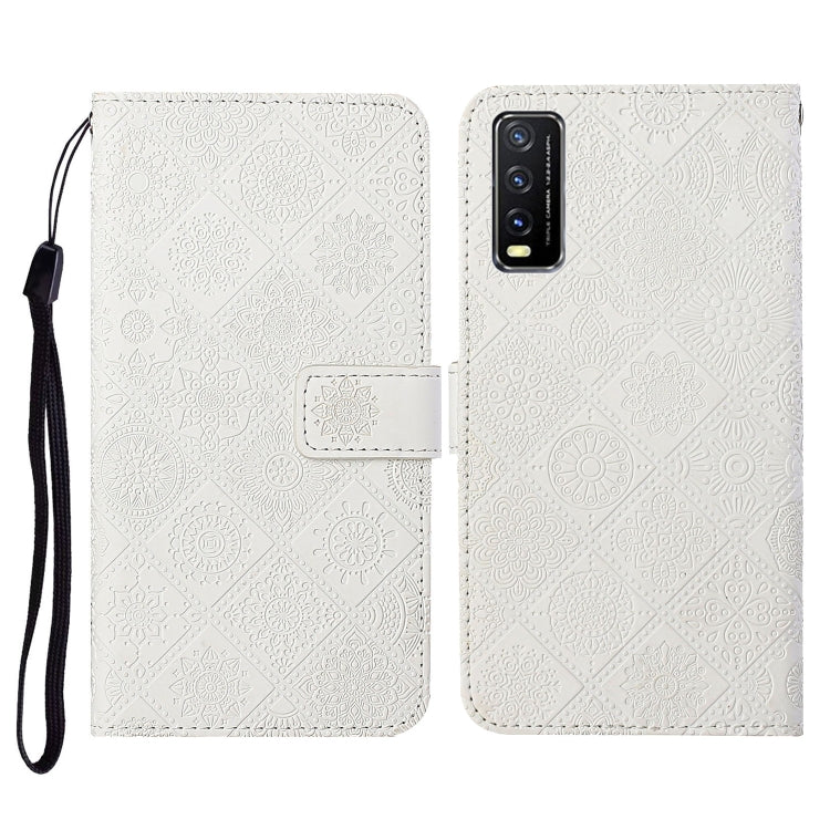 White embossed leather folio phone case with card slots and wrist lanyard