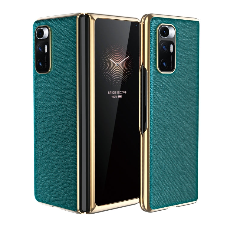Dark green leather-texture protective phone case with gold-tone edges and dual rear cameras
