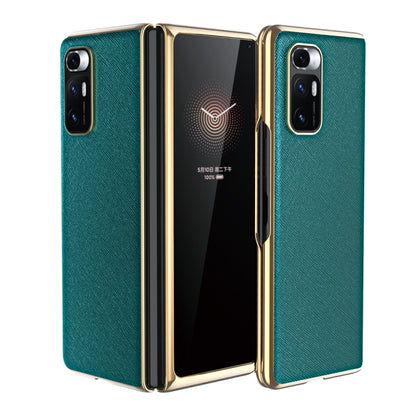 Dark green leather-texture protective phone case with gold-tone edges and dual rear cameras