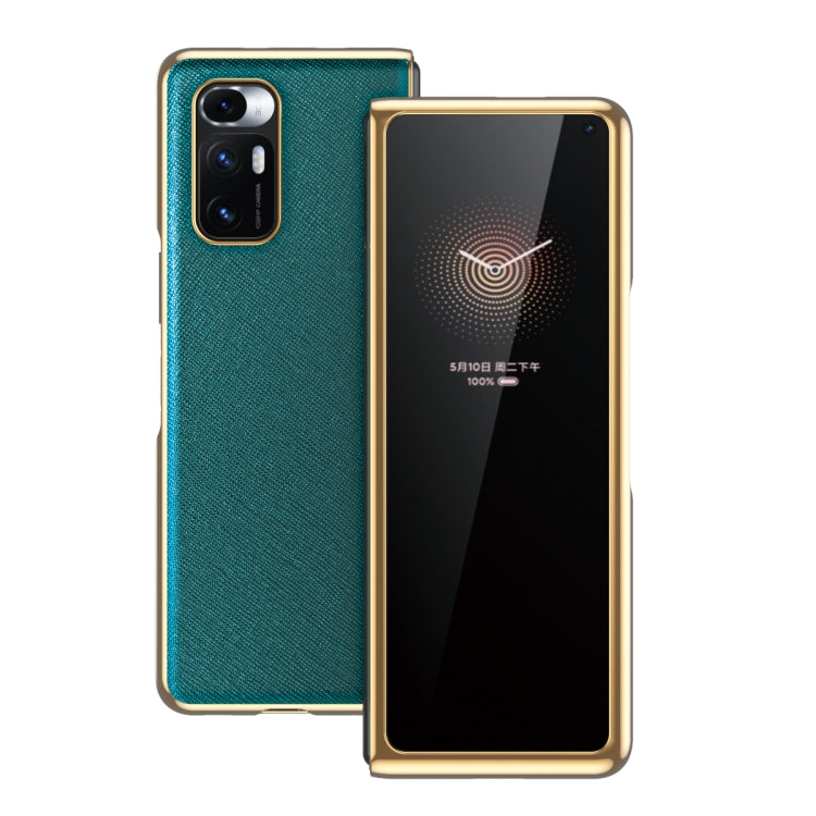 Teal leather-texture protective phone case with gold-tone frame and dual rear cameras
