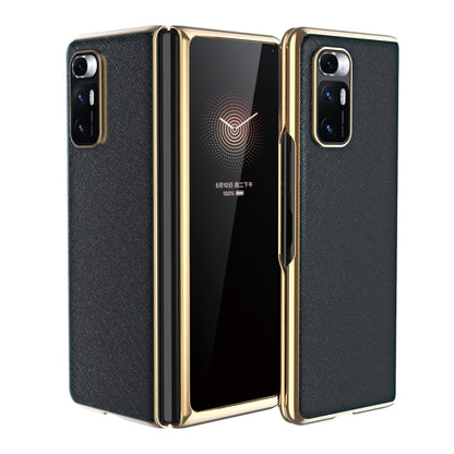 Dark gray leather-texture protective phone case with gold-tone edges and dual rear cameras