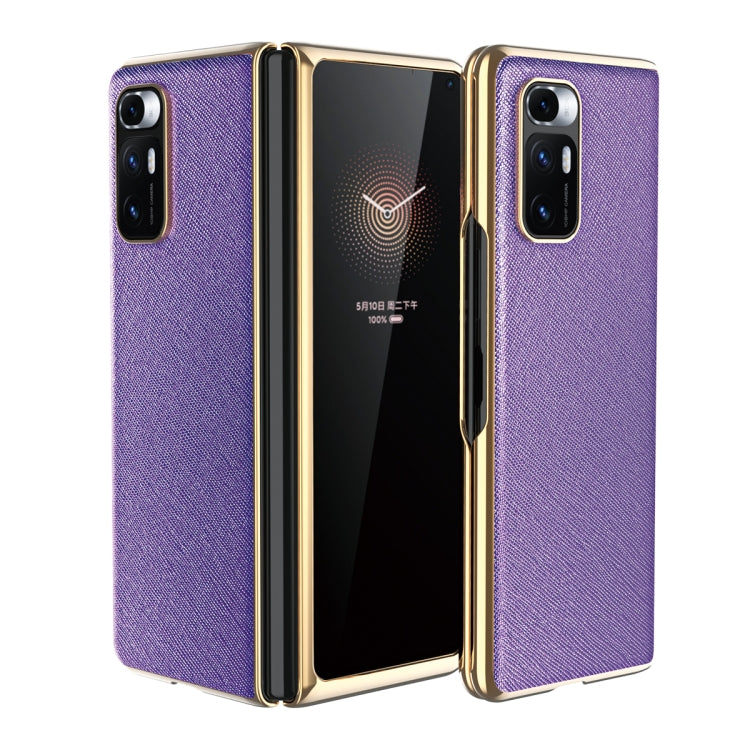 Purple leather-texture protective phone case with gold-tone edges and dual rear cameras