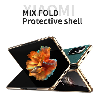 Foldable phone protective shell in teal leather texture with gold-tone hinge and camera cutouts